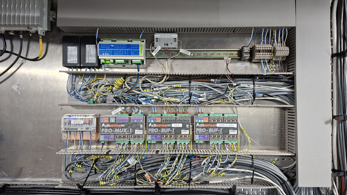 Converter installed alongside other vessel systems